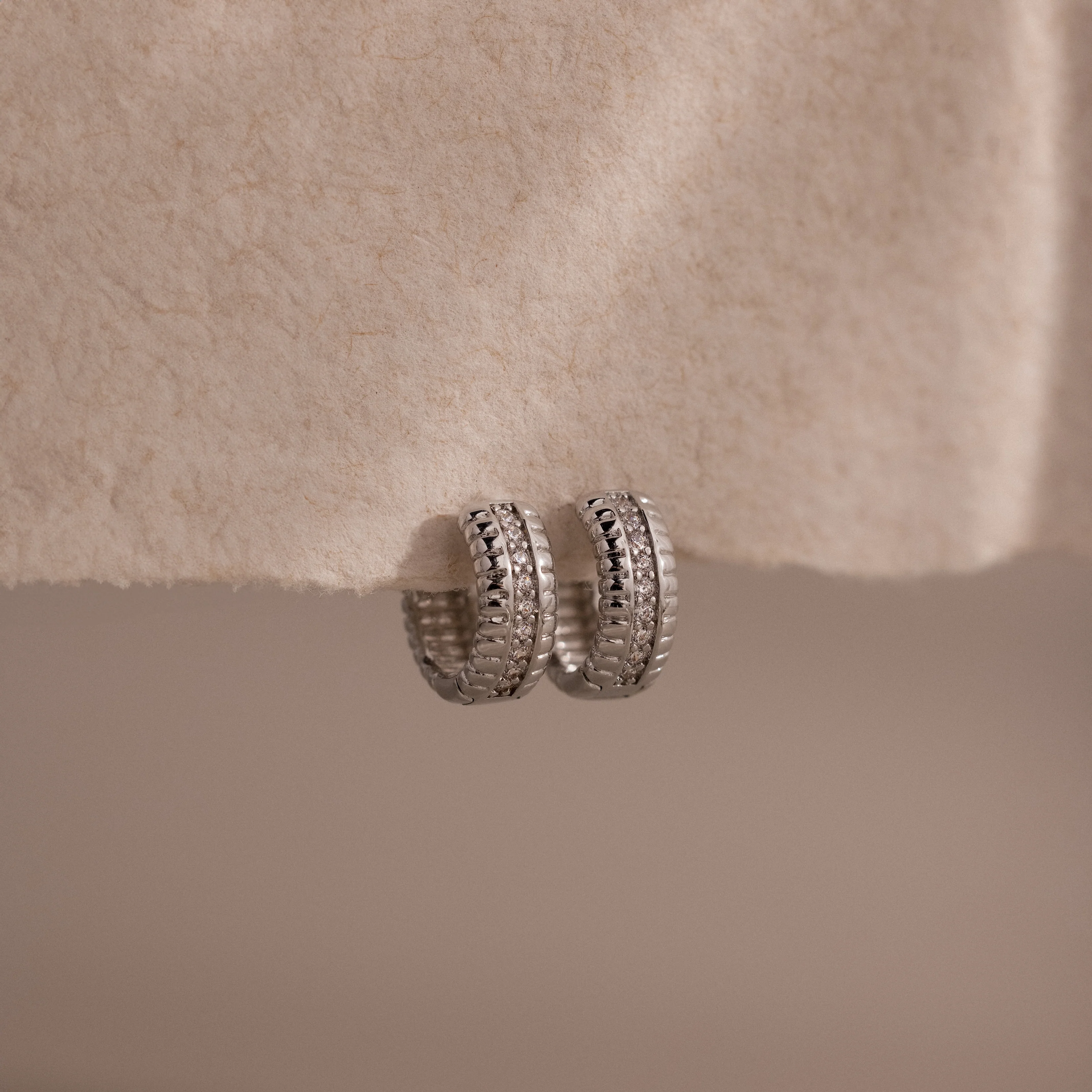 Ribbed Pave Huggies in Silver