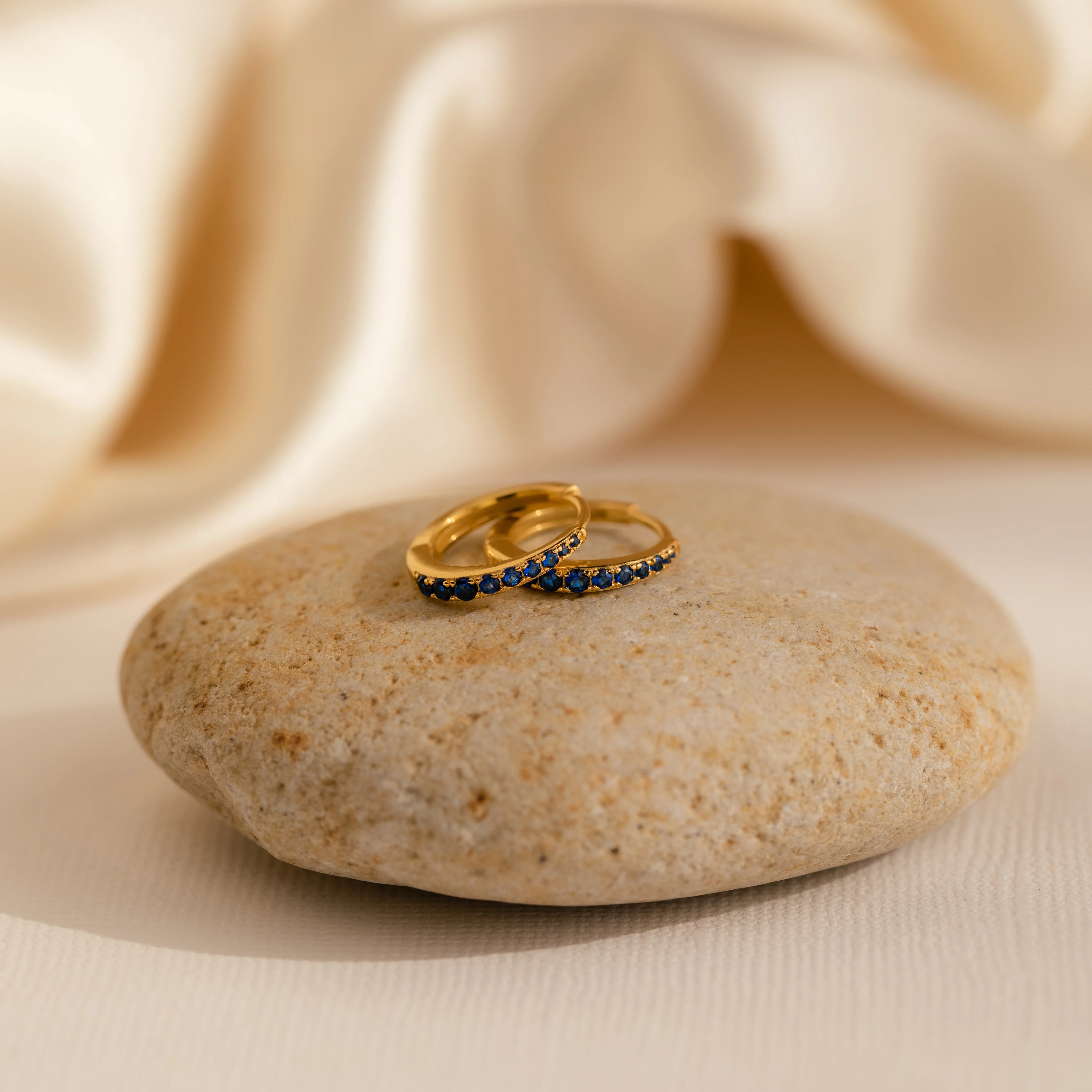 Vera Pave Topaz Huggies